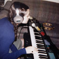 [photo of Estelle recording keys and vocals]