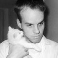 [photo of Josh holding cat]